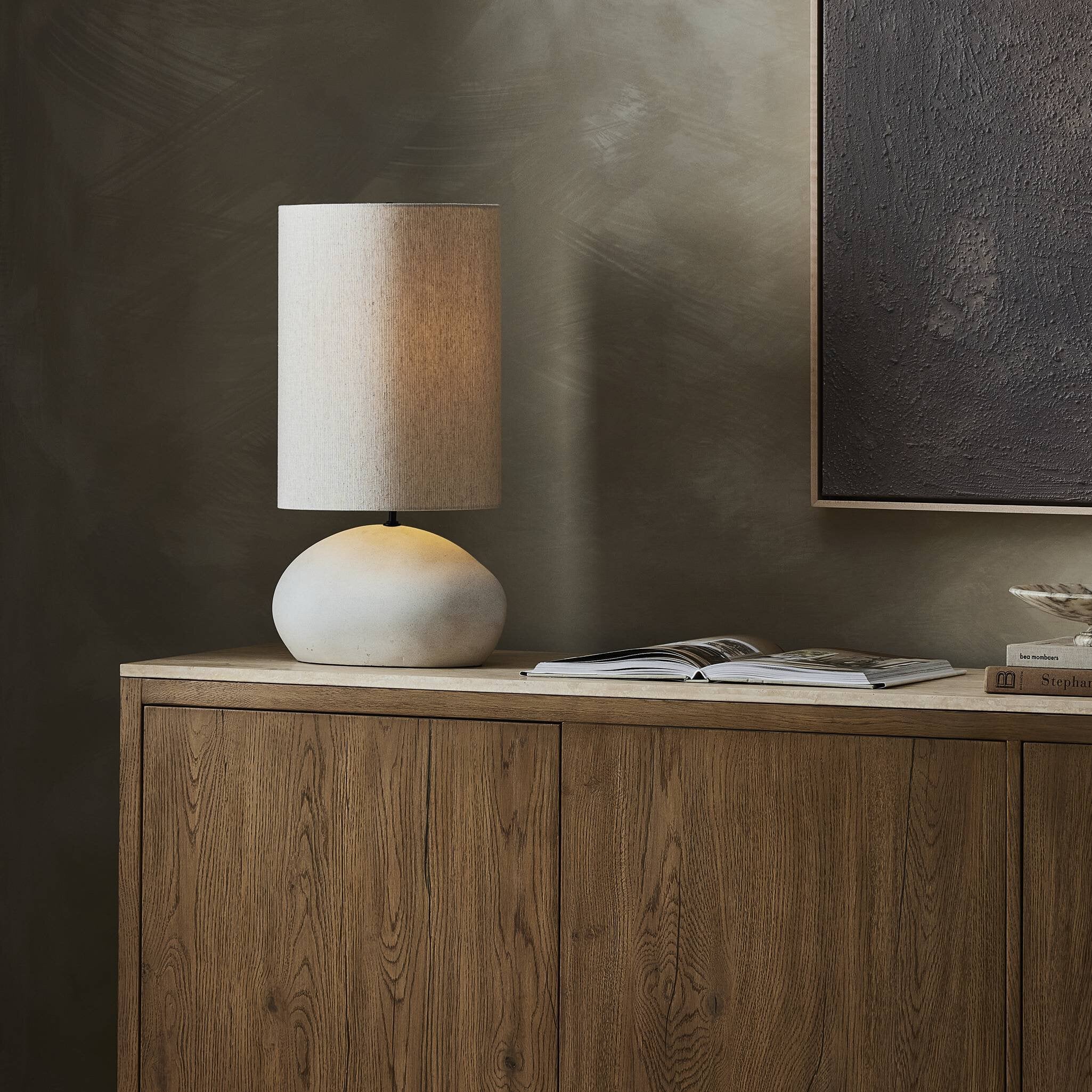 Featuring Allura White Speckled Ceramic Table Lamp by Four Hands at Amethyst Home. A curved ceramic base with a speckled matte finish supports an extra-tall flax linen shade. This elongated silhouette brings a sculptural look to any tabletop.Overall Dimensions: 12.00"w x 11.00"d x 23.00"hWeight : 6.44 lbsMaterials : Ceramic, Thermoplastic, 65% Polyester, 35% Flax/Linen. Amethyst Home provides interior design, new construction, custom furniture, and area rugs in the Salt Lake City metro area
