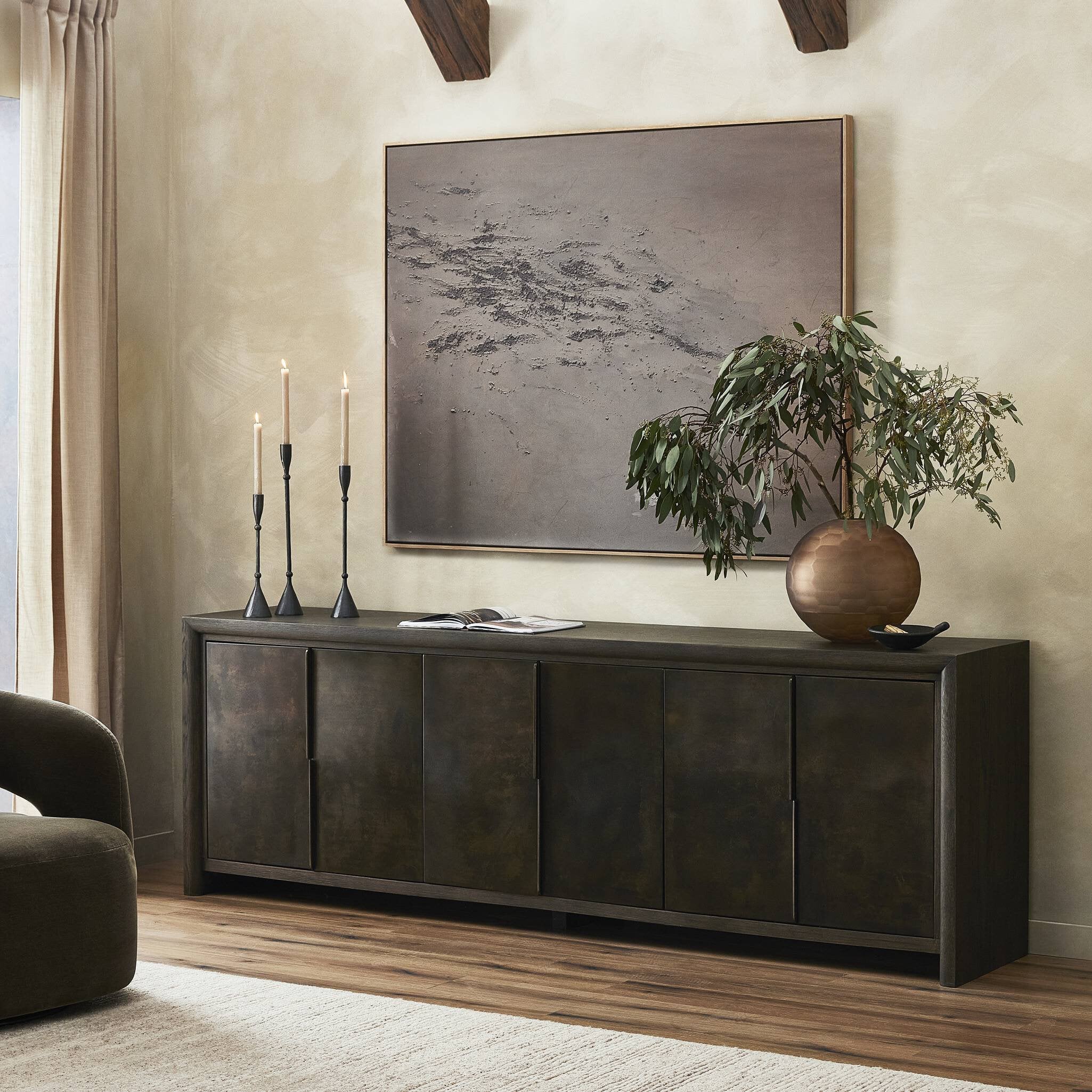 Featuring Arlington Espresso Oak 6 Door Sideboard by Four Hands at Amethyst Home. Espresso-finished oak casing pairs with six coffee-colored iron door fronts, for an intriguing material mix. With bullnose waterfall framing and offset metal hardware, this spacious sideboard offers an elevated industrial look. Three rear cutouts for cord management.Overall Dimensions: 96.00"w x 20.00"d. Amethyst Home provides interior design, new construction, custom furniture, and area rugs in the Austin metro area