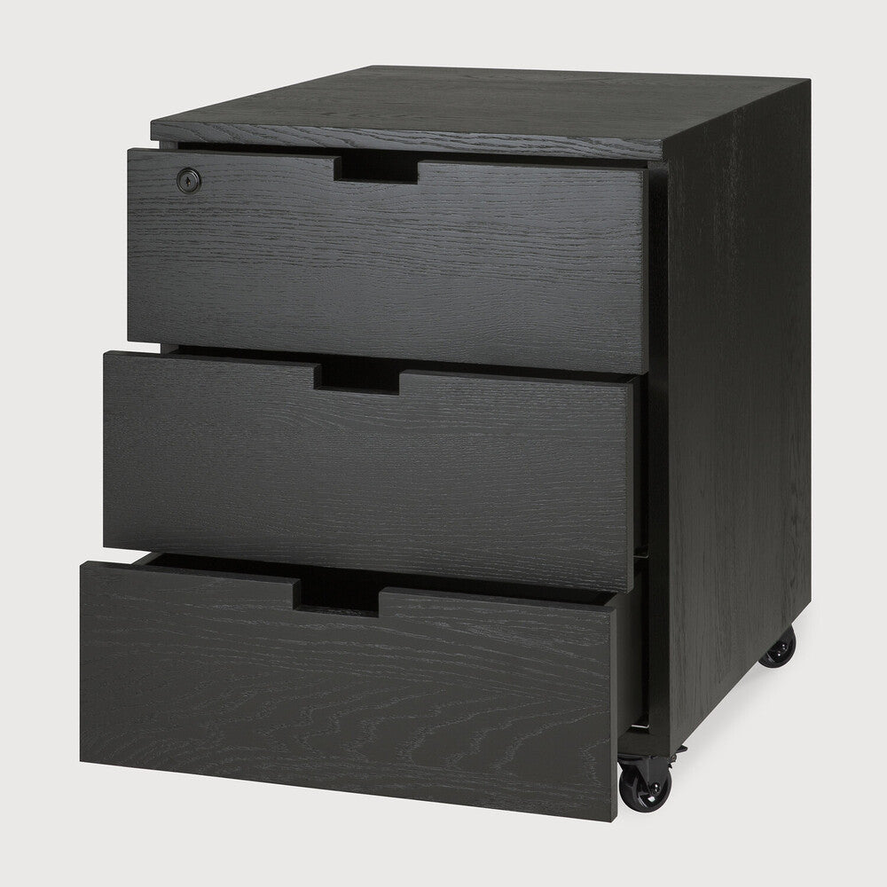 Featuring Billy Varnished Oak Black Drawer Unit by Ethnicraft at Amethyst Home. Organise your work space with the Billy drawer unit in solid oak. It features three soft-closing drawers and easy access thanks to the handy wheels. On its own or under a desk, it is the simple staple every office needs.Weight : 75 lb Dimensions: 22.5 in W x 20 in L x 24.5 in HBrushed : YesCollecti. Amethyst Home provides interior design, new construction, custom furniture, and area rugs in the Winter Garden metro area