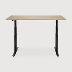 Featuring Bok Black Us Oak Adjustable Desk by Ethnicraft at Amethyst Home. The Bok adjustable desk was designed with the importance of health and good posture in mind. The motorised system in its legs allows the tabletop to be elevated to the height of your liking. That way, you can easily switch between sitting and standing throughout the workday. Choose between white or black me. Amethyst Home provides interior design, new construction, custom furniture, and area rugs in the Charlotte metro area