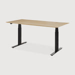 Featuring Bok Black Us Oak Adjustable Desk by Ethnicraft at Amethyst Home. The Bok adjustable desk was designed with the importance of health and good posture in mind. The motorised system in its legs allows the tabletop to be elevated to the height of your liking. That way, you can easily switch between sitting and standing throughout the workday. Choose between white or black me. Amethyst Home provides interior design, new construction, custom furniture, and area rugs in the San Diego metro area