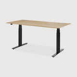 Featuring Bok Black Us Oak Adjustable Desk by Ethnicraft at Amethyst Home. The Bok adjustable desk was designed with the importance of health and good posture in mind. The motorised system in its legs allows the tabletop to be elevated to the height of your liking. That way, you can easily switch between sitting and standing throughout the workday. Choose between white or black me. Amethyst Home provides interior design, new construction, custom furniture, and area rugs in the San Diego metro area