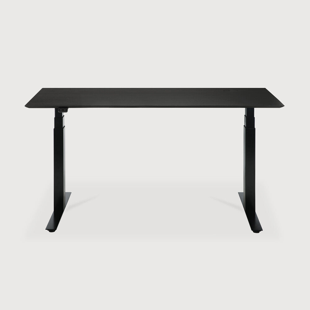 Featuring Bok Black Us Oak Black Adjustable Desk by Ethnicraft at Amethyst Home. The Bok adjustable desk was designed with the importance of health and good posture in mind. The motorised system in its legs allows the tabletop to be elevated to the height of your liking. That way, you can easily switch between sitting and standing throughout the workday. Choose between white or bl. Amethyst Home provides interior design, new construction, custom furniture, and area rugs in the Nashville metro area