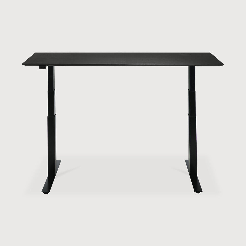 Featuring Bok Black Us Oak Black Adjustable Desk by Ethnicraft at Amethyst Home. The Bok adjustable desk was designed with the importance of health and good posture in mind. The motorised system in its legs allows the tabletop to be elevated to the height of your liking. That way, you can easily switch between sitting and standing throughout the workday. Choose between white or bl. Amethyst Home provides interior design, new construction, custom furniture, and area rugs in the Nashville metro area