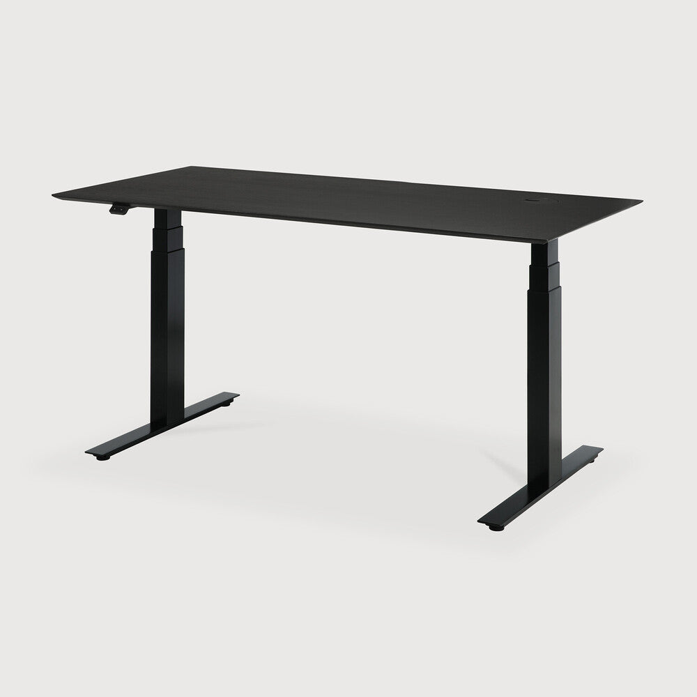 Featuring Bok Black Us Oak Black Adjustable Desk by Ethnicraft at Amethyst Home. The Bok adjustable desk was designed with the importance of health and good posture in mind. The motorised system in its legs allows the tabletop to be elevated to the height of your liking. That way, you can easily switch between sitting and standing throughout the workday. Choose between white or black . Amethyst Home provides interior design, new construction, custom furniture, and area rugs in the Tampa metro area