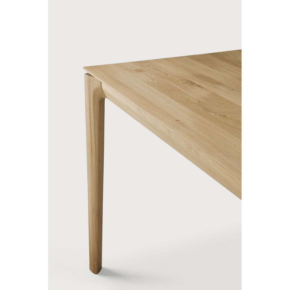 Featuring Bok Oak Desk by Ethnicraft at Amethyst Home. Reminiscent of a goat's curved horns, the Bok collection combines sculptural elegance and contemporary crafting into a graceful and airy form. This Bok desk adds the warmth of solid wood and simplistic practicality to any office space.Brushed : NoCollection : BokFinish : VarnishedFloor Protector : NoMain Material : OakShape : R. Amethyst Home provides interior design, new construction, custom furniture, and area rugs in the Portland metro area