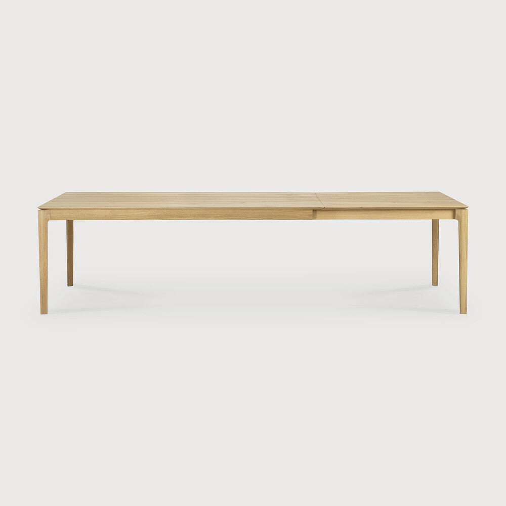 Featuring Bok Oak Rectangular Extendable Dining Table by Ethnicraft at Amethyst Home. Reminiscent of a goat's curved horns, the Bok collection combines sculptural elegance and contemporary crafting into a graceful and airy form. The signature Bok table made extendable to bring even more people together. Its airy shape yet rock-solid construction makes this solid oak extendable din. Amethyst Home provides interior design, new construction, custom furniture, and area rugs in the Calabasas metro area