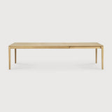 Featuring Bok Oak Rectangular Extendable Dining Table by Ethnicraft at Amethyst Home. Reminiscent of a goat's curved horns, the Bok collection combines sculptural elegance and contemporary crafting into a graceful and airy form. The signature Bok table made extendable to bring even more people together. Its airy shape yet rock-solid construction makes this solid oak extendable din. Amethyst Home provides interior design, new construction, custom furniture, and area rugs in the Calabasas metro area