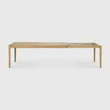 Featuring Bok Oak Rectangular Extendable Dining Table by Ethnicraft at Amethyst Home. Reminiscent of a goat's curved horns, the Bok collection combines sculptural elegance and contemporary crafting into a graceful and airy form. The signature Bok table made extendable to bring even more people together. Its airy shape yet rock-solid construction makes this solid oak extendable din. Amethyst Home provides interior design, new construction, custom furniture, and area rugs in the Calabasas metro area