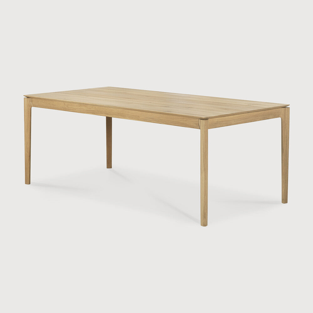 Featuring Bok Oak Rectangular Extendable Dining Table by Ethnicraft at Amethyst Home. Reminiscent of a goat's curved horns, the Bok collection combines sculptural elegance and contemporary crafting into a graceful and airy form. The signature Bok table made extendable to bring even more people together. Its airy shape yet rock-solid construction makes this solid oak extendable. Amethyst Home provides interior design, new construction, custom furniture, and area rugs in the Newport Beach metro area