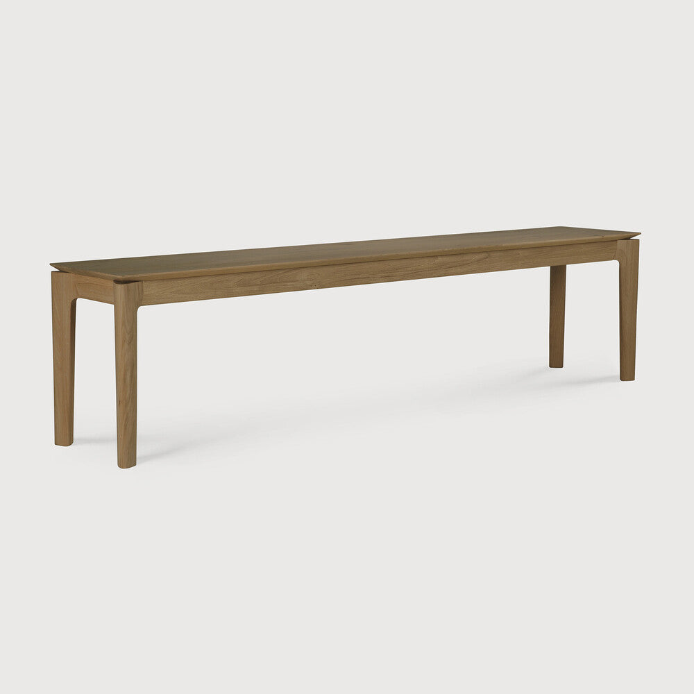 Featuring Bok Teak Bench by Ethnicraft at Amethyst Home. Reminiscent of a goat's curved horns, the Bok collection combines sculptural elegance and contemporary crafting into a graceful and airy form. The Bok bench will pair perfectly with the Bok dining table. But also, as a stand-alone against a wall, in a hallway, or at the end of a bed.Adjustable Feet : NoBrushed : NoCollec. Amethyst Home provides interior design, new construction, custom furniture, and area rugs in the Newport Beach metro area