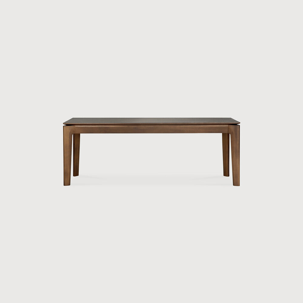 Featuring Bok Teak Brown Bench by Ethnicraft at Amethyst Home. Reminiscent of a goat's curved horns, the Bok collection combines sculptural elegance and contemporary crafting into a graceful and airy form. The Bok bench pairs well with the Bok dining table, but also as a stand-alone against a wall, in a hallway or at the end of a bed.Adjustable Feet : NoBrushed : NoCollection : Bo. Amethyst Home provides interior design, new construction, custom furniture, and area rugs in the San Diego metro area