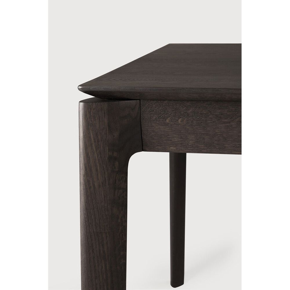 Featuring Bok Varnished Oak Brown Dining Table by Ethnicraft at Amethyst Home. Just like its matching chair, the Bok dining table has become one of our signature designs. Its airy shape yet rock solid construction make this piece a timeless and remarkable design to enjoy for years to come.Collection : BokExtendable : NoFinish : VarnishedFloor Protector : YesMain Material : Oak. Amethyst Home provides interior design, new construction, custom furniture, and area rugs in the Winter Garden metro area