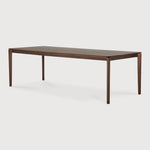 Featuring Bok Varnished Teak Brown Dining Table by Ethnicraft at Amethyst Home. Reminiscent of a goat's curved horns, the Bok collection combines sculptural elegance and contemporary crafting into a graceful and airy form. Just like its matching chair, the Bok dining table has become one of our signature designs. A timeless design to enjoy for years to come.Adjustable Feet : NoBru. Amethyst Home provides interior design, new construction, custom furniture, and area rugs in the Charlotte metro area