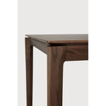 Featuring Bok Varnished Teak Brown Dining Table by Ethnicraft at Amethyst Home. Reminiscent of a goat's curved horns, the Bok collection combines sculptural elegance and contemporary crafting into a graceful and airy form. Just like its matching chair, the Bok dining table has become one of our signature designs. A timeless design to enjoy for years to come.Adjustable Feet : NoBru. Amethyst Home provides interior design, new construction, custom furniture, and area rugs in the Park City metro area