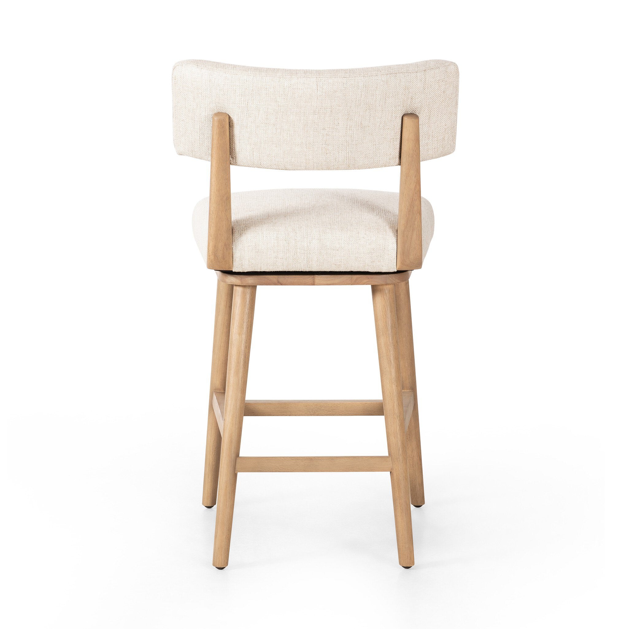 Featuring Cardell Essence Natural Swivel Bar + Counter Stool by Four Hands at Amethyst Home. Natural solid parawood forms a curved barrel back on this everyday dining stool featuring a memory swivel. Plush cushioned seat and back are upholstered in a textural woven fabric.BarOverall Dimensions: 21.50"w x 22.25"d x 42.50"hWeight: 24.25 lbsCounterOverall Dimensions: 21.50"w x 22. Amethyst Home provides interior design, new construction, custom furniture, and area rugs in the Winter Garden metro area