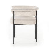 Featuring Carrie Light Camel Dining Chair by Four Hands at Amethyst Home. Airy and light with slim, black-finished iron framing, camel-colored upholstery lends texture to a beautifully sculpted dining style featuring a yoke back and exterior fold detailing.Overall Dimensions: 25.50"w x 23.00"d x 27.50"hWeight : 29.54 lbsMaterials : 100% Polyester, Iron, Poplar Plywood. Amethyst Home provides interior design, new construction, custom furniture, and area rugs in the Charlotte metro area