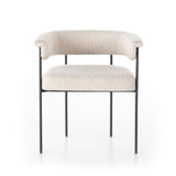 Featuring Carrie Light Camel Dining Chair by Four Hands at Amethyst Home. Airy and light with slim, black-finished iron framing, camel-colored upholstery lends texture to a beautifully sculpted dining style featuring a yoke back and exterior fold detailing.Overall Dimensions: 25.50"w x 23.00"d x 27.50"hWeight : 29.54 lbsMaterials : 100% Polyester, Iron, Poplar Plywood. Amethyst Home provides interior design, new construction, custom furniture, and area rugs in the Monterey metro area
