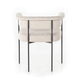 Featuring Carrie Light Camel Dining Chair by Four Hands at Amethyst Home. Airy and light with slim, black-finished iron framing, camel-colored upholstery lends texture to a beautifully sculpted dining style featuring a yoke back and exterior fold detailing.Overall Dimensions: 25.50"w x 23.00"d x 27.50"hWeight : 29.54 lbsMaterials : 100% Polyester, Iron, Poplar Plywood. Amethyst Home provides interior design, new construction, custom furniture, and area rugs in the Monterey metro area