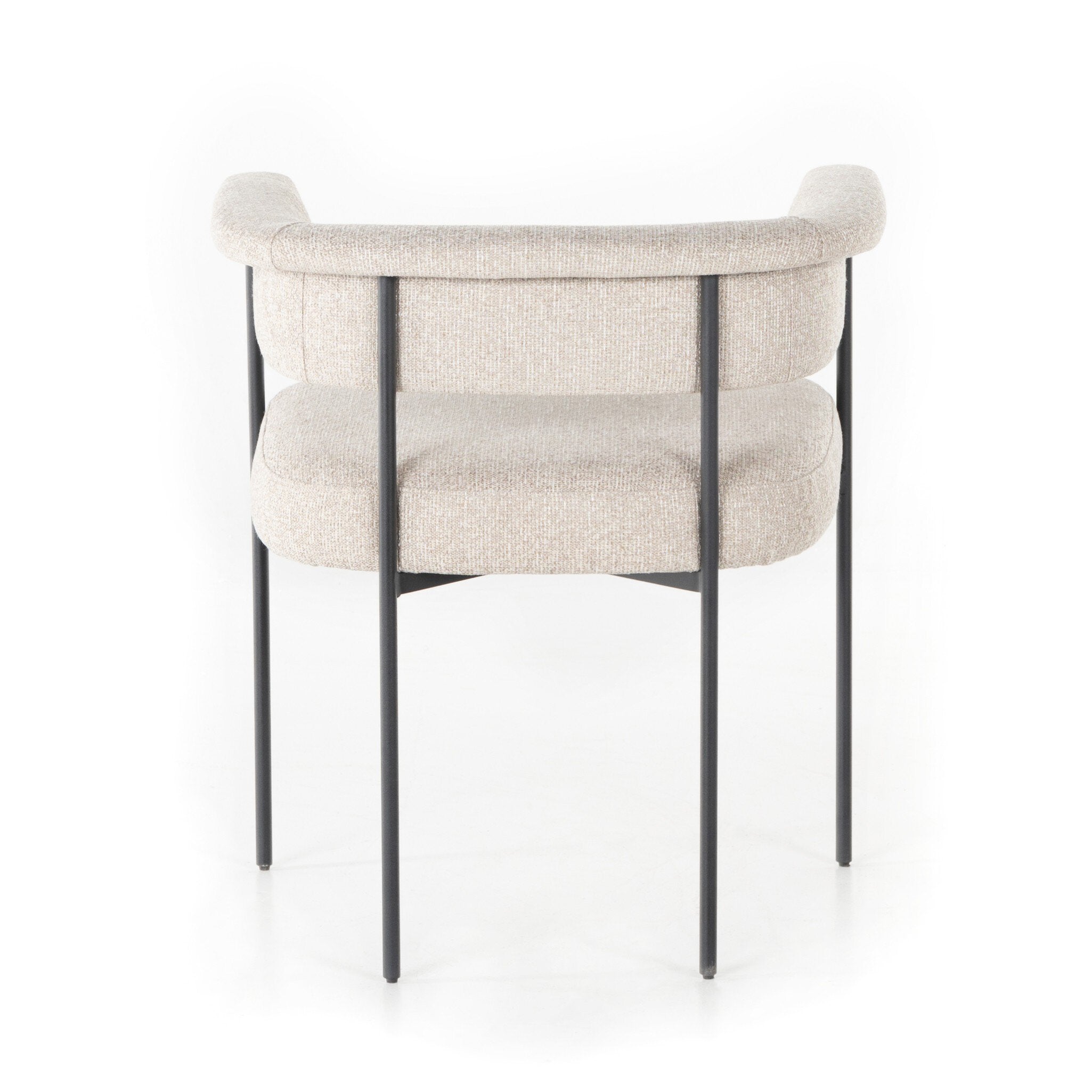 Featuring Carrie Light Camel Dining Chair by Four Hands at Amethyst Home. Airy and light with slim, black-finished iron framing, camel-colored upholstery lends texture to a beautifully sculpted dining style featuring a yoke back and exterior fold detailing.Overall Dimensions: 25.50"w x 23.00"d x 27.50"hWeight : 29.54 lbsMaterials : 100% Polyester, Iron, Poplar Plywood. Amethyst Home provides interior design, new construction, custom furniture, and area rugs in the Monterey metro area