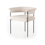Featuring Carrie Light Camel Dining Chair by Four Hands at Amethyst Home. Airy and light with slim, black-finished iron framing, camel-colored upholstery lends texture to a beautifully sculpted dining style featuring a yoke back and exterior fold detailing.Overall Dimensions: 25.50"w x 23.00"d x 27.50"hWeight : 29.54 lbsMaterials : 100% Polyester, Iron, Poplar Plywood. Amethyst Home provides interior design, new construction, custom furniture, and area rugs in the Omaha metro area