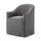 Featuring Cove Bergamo Charcoal Dining Chair With Casters by Four Hands at Amethyst Home. Upgrade your dining experience with the Cove Bergamo Charcoal Dining Chair. With its sleek design and casters, this chair combines style and convenience for your dining room. Crafted with expert precision, this chair provides optimal support and comfort for every meal. Elevate your dining space. Amethyst Home provides interior design, new construction, custom furniture, and area rugs in the Houston metro area