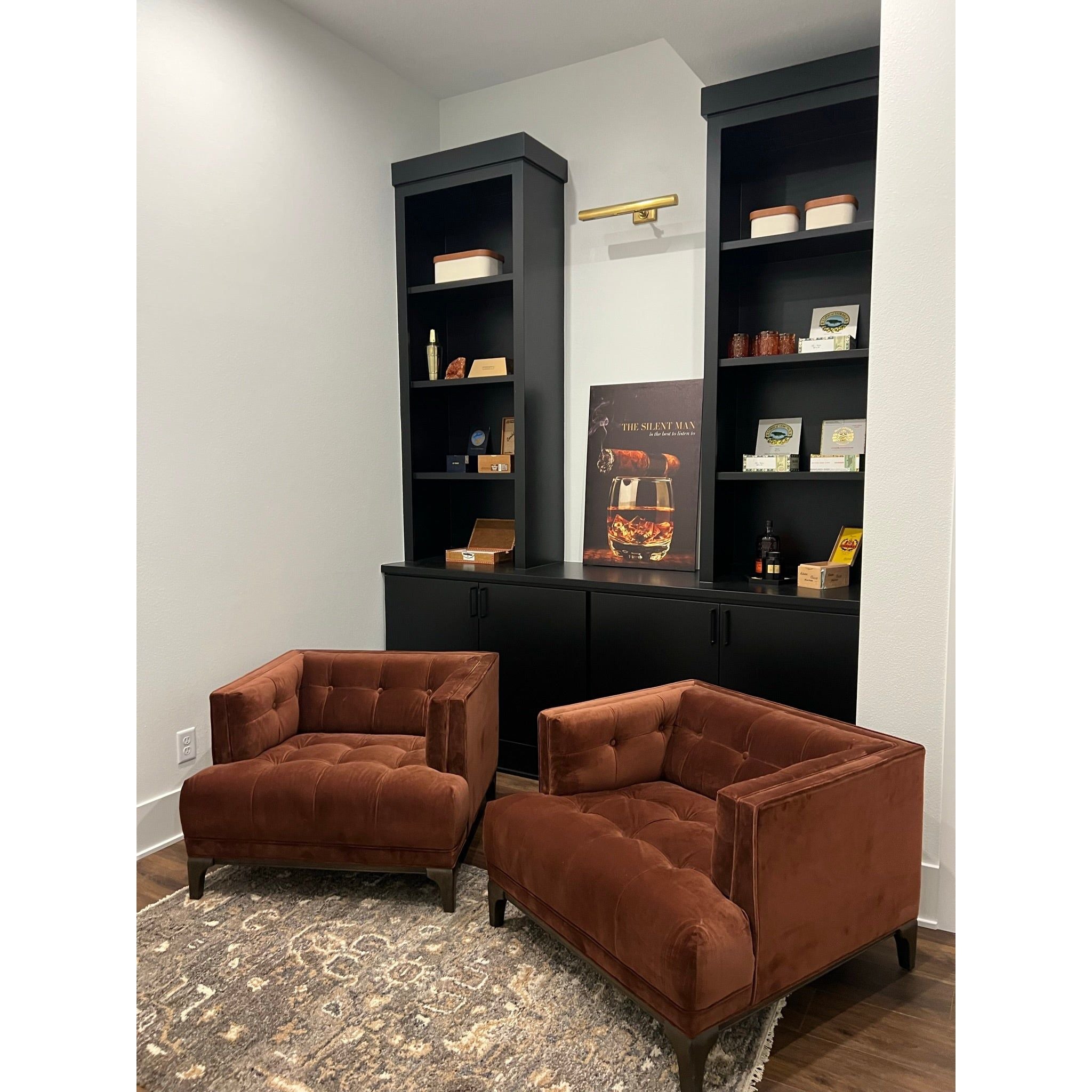 This low, tailored midcentury silhouette is upholstered in a velvety auburn fabric, with dramatic blind tufting for texture. Amethyst Home provides interior design, new home construction design consulting, vintage area rugs, and lighting in the Houston metro area.