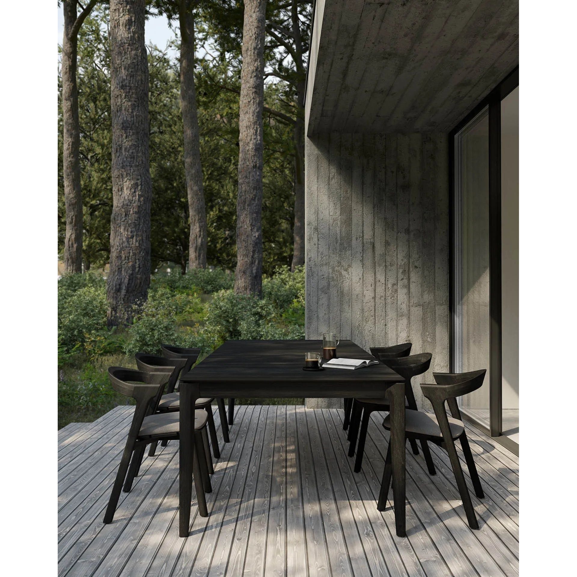 Featuring Bok Teak Black Outdoor Dining Table by Ethnicraft at Amethyst Home. Reminiscent of a goat's curved horns, the Bok collection combines sculptural elegance and contemporary crafting into a graceful and airy form. The Bok dining table's airy shape yet rock-solid construction make this piece a timeless and remarkable design to enjoy for all the years to c. Amethyst Home provides interior design, new home construction design consulting, vintage area rugs, and lighting in the Tampa metro area.