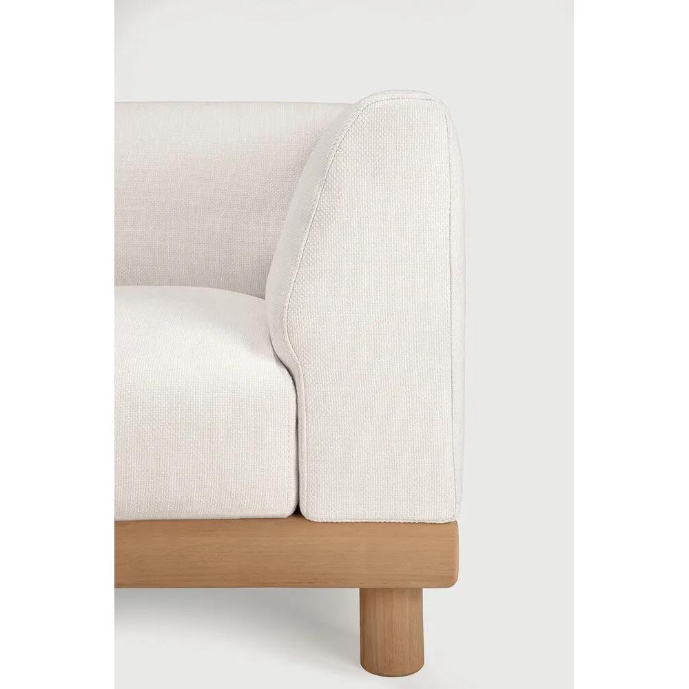 Combining elegance and sleek lines in a relaxed silhouette, the Monocle feels refined, inviting and grounded. Its soft cushions bring an indoor level of comfort to outdoor living, while the solid wooden base anchors the piece with warmth and balance. Amethyst Home provides interior design, new home construction design consulting, vintage area rugs, and lighting in the Dallas metro area.