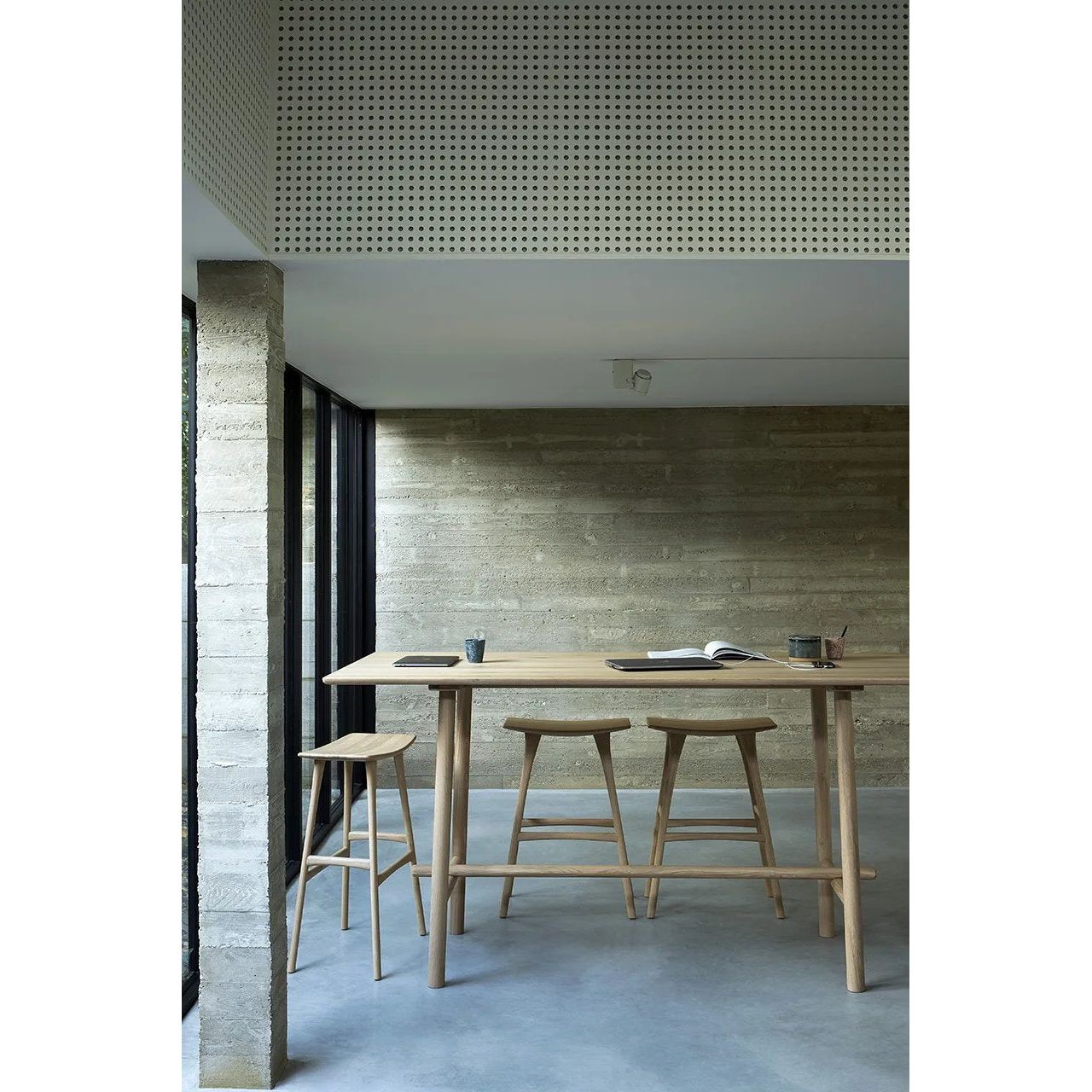 We love the versatility of this Oak Osso Bar Stool.  A sleek piece to add in your bar area, kitchen island, or a standing desk stool. Amethyst Home provides interior design, new home construction design consulting, vintage area rugs, and lighting in the Dallas metro area.