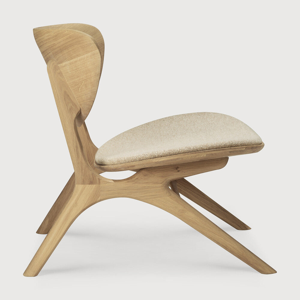 Featuring Eye Off White Oak Lounge Chair by Ethnicraft at Amethyst Home. Beauty is in the eye of the beholder. With sleek, angular, front legs and flowing smooth connections, the Eye lounge chair is a hallmark solid wooden seating design. The curved backrest, reminiscent of a winked eye, inspired the name of the chair. Think subtle elegance with a stylish edge.Weight : 51 lb Dimen. Amethyst Home provides interior design, new construction, custom furniture, and area rugs in the Nashville metro area
