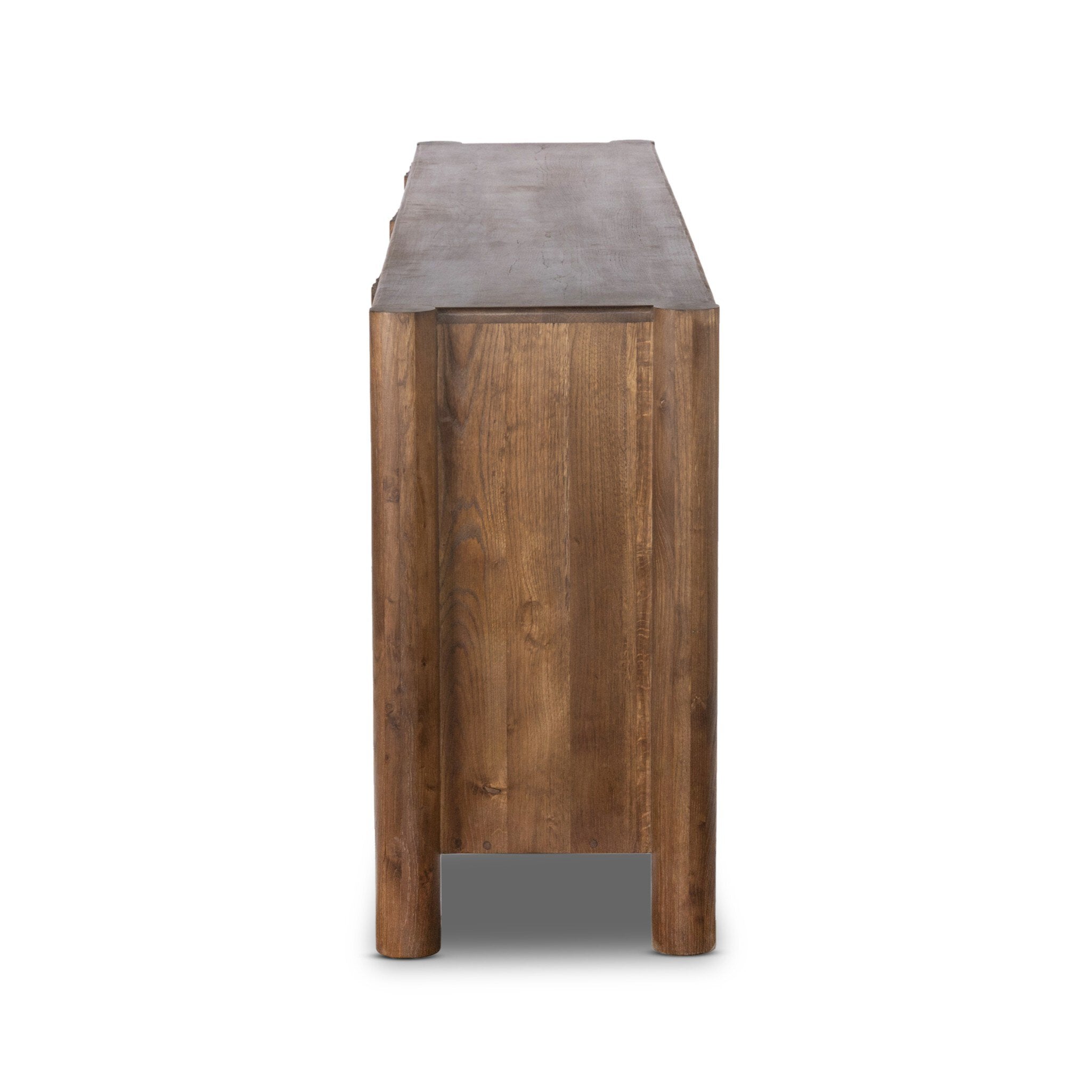 Featuring Ezri Cocoa Oak Sideboard by Four Hands at Amethyst Home. Grain and character variation within a solid oak finish give this sideboard organic visual interest. The carved design and floor-to-top cylinder legs give a primitive look that balances the movement of the wood pattern.Overall Dimensions: 98.00"w x 18.00"d x 34.00"hWeight : 245.38 lbsMaterials : Solid Oak. Amethyst Home provides interior design, new construction, custom furniture, and area rugs in the Scottsdale metro area