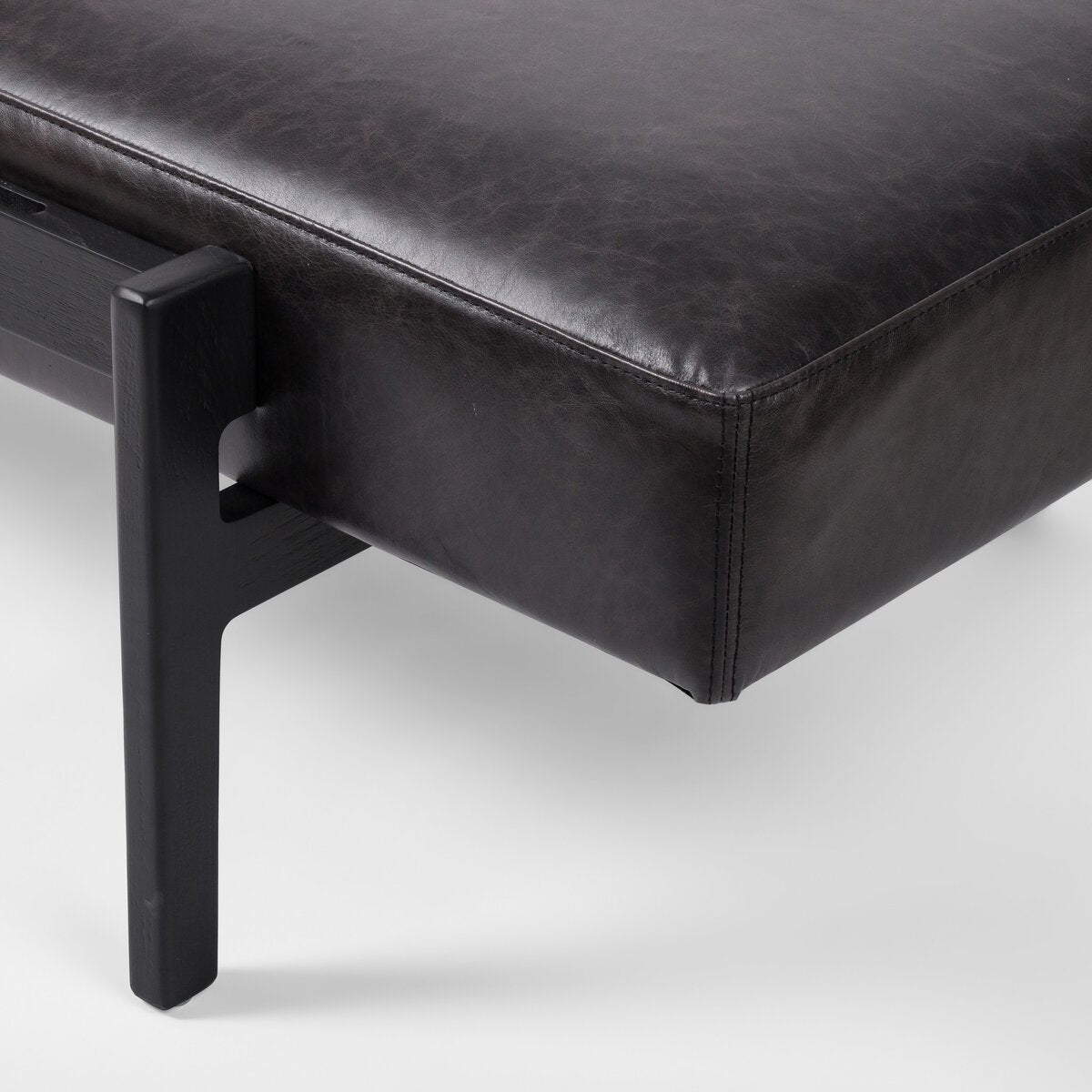 Featuring Fawkes Sonoma Black Bench by Four Hands at Amethyst Home. A uniquely modern statement piece inspired by the functional mid-century–style telephone bench, top-grain leather seating features a sliding tray of solid beechwood – the perfect place for a favorite book or cocktail. Great in the entryway or living room.Overall Dimensions: 78.75"w x 28.00"d x 20.00"hWeight : 59.7. Amethyst Home provides interior design, new construction, custom furniture, and area rugs in the Calabasas metro area