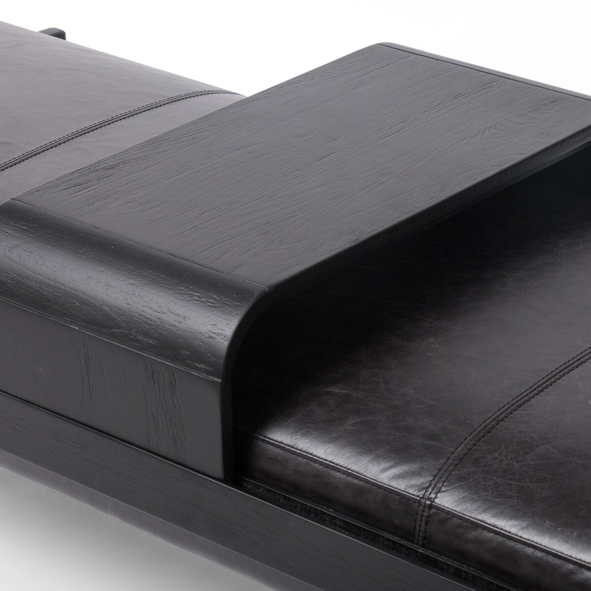Featuring Fawkes Sonoma Black Bench by Four Hands at Amethyst Home. A uniquely modern statement piece inspired by the functional mid-century–style telephone bench, top-grain leather seating features a sliding tray of solid beechwood – the perfect place for a favorite book or cocktail. Great in the entryway or living room.Overall Dimensions: 78.75"w x 28.00"d x 20.00"hWeight : 59.. Amethyst Home provides interior design, new construction, custom furniture, and area rugs in the Des Moines metro area