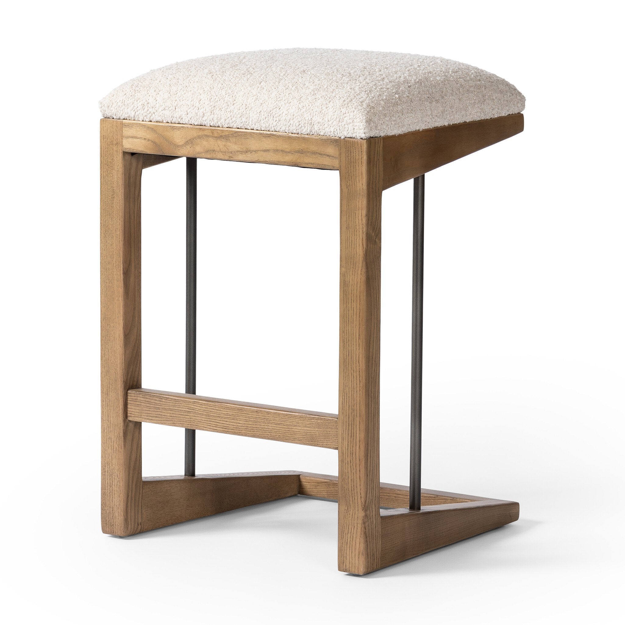 Featuring Finn Somerton Ash Bar + Counter Stool by Four Hands at Amethyst Home. A stunner from every angle, this architecturally inspired counter stool features an angular base crafted from solid ash with two iron rods for added support and visual interest. Seat is upholstered in a linen/cotton/poly blend performance fabric with subtle texture throughout. Performance fabrics are. Amethyst Home provides interior design, new construction, custom furniture, and area rugs in the Kansas City metro area