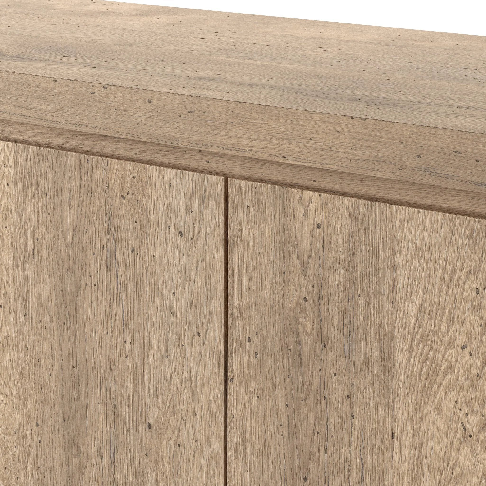 Made from thick-cut oak veneer with a rustic finish, this spacious media console features a pedestal base and dovetail joinery detailing.As lovers of clean aesthetics at Amethyst, we love the warm modern inspired Abaso Media Console - Whitewash Rustic Wormwood Oak. Amethyst Home provides interior design, new home construction design consulting, vintage area rugs, and lighting in the Austin metro area.