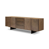 Designed around the piece’s slim metal legs, this media console combines aged brass-finished iron and aged smoked oak veneer for a sleek, modern look. Shelving and drawers provide ample room for your living or media space essentials. Rear cutouts for cord management. Amethyst Home provides interior design, new home construction design consulting, vintage area rugs, and lighting in the Portland metro area.