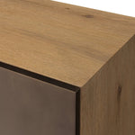 Designed around the piece’s slim metal legs, this media console combines aged brass-finished iron and aged smoked oak veneer for a sleek, modern look. Shelving and drawers provide ample room for your living or media space essentials. Rear cutouts for cord management. Amethyst Home provides interior design, new home construction design consulting, vintage area rugs, and lighting in the San Diego metro area.