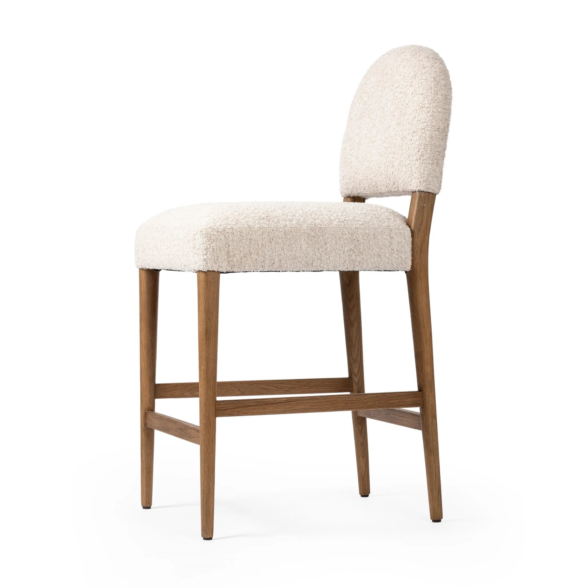 Featuring Abilene Somerton Ash Bar + Counter Stool by Four Hands at Amethyst Home. A heritage design gets a modern twist. Simple tapered legs of warm oak mark this dining room chair's traditional form, while an arched seat back with off-white upholstery updates this comfortable seating style, perfectly sized for the counter. Performance fabrics are specially . Amethyst Home provides interior design, new home construction design consulting, vintage area rugs, and lighting in the Houston metro area.