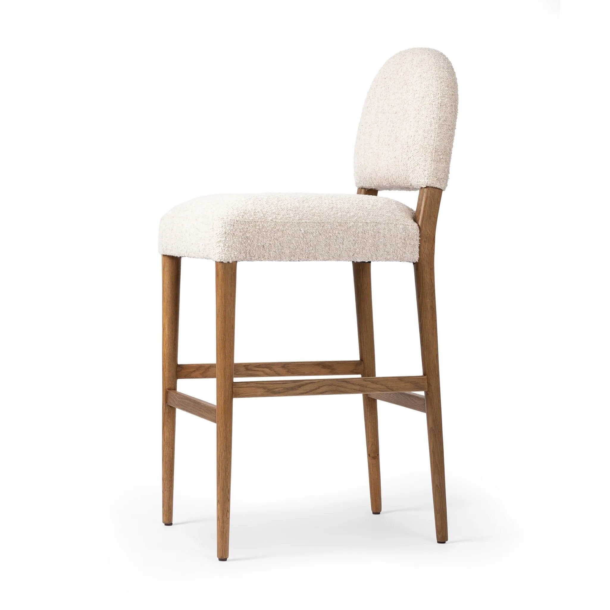 Featuring Abilene Somerton Ash Bar + Counter Stool by Four Hands at Amethyst Home. A heritage design gets a modern twist. Simple tapered legs of warm oak mark this dining room chair's traditional form, while an arched seat back with off-white upholstery updates this comfortable seating style, perfectly sized for the counter. Performance fabrics are specially. Amethyst Home provides interior design, new home construction design consulting, vintage area rugs, and lighting in the Portland metro area.