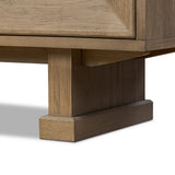 Store favorite dinnerware, table linens and more in this modernized Deco sideboard, with inverted chamfered framing and molding around the doors. Made from solid oak with a light, drifted finish and ski-style legs that elevate the whole piece Amethyst Home provides interior design, new home construction design consulting, vintage area rugs, and lighting in the Des Moines metro area.