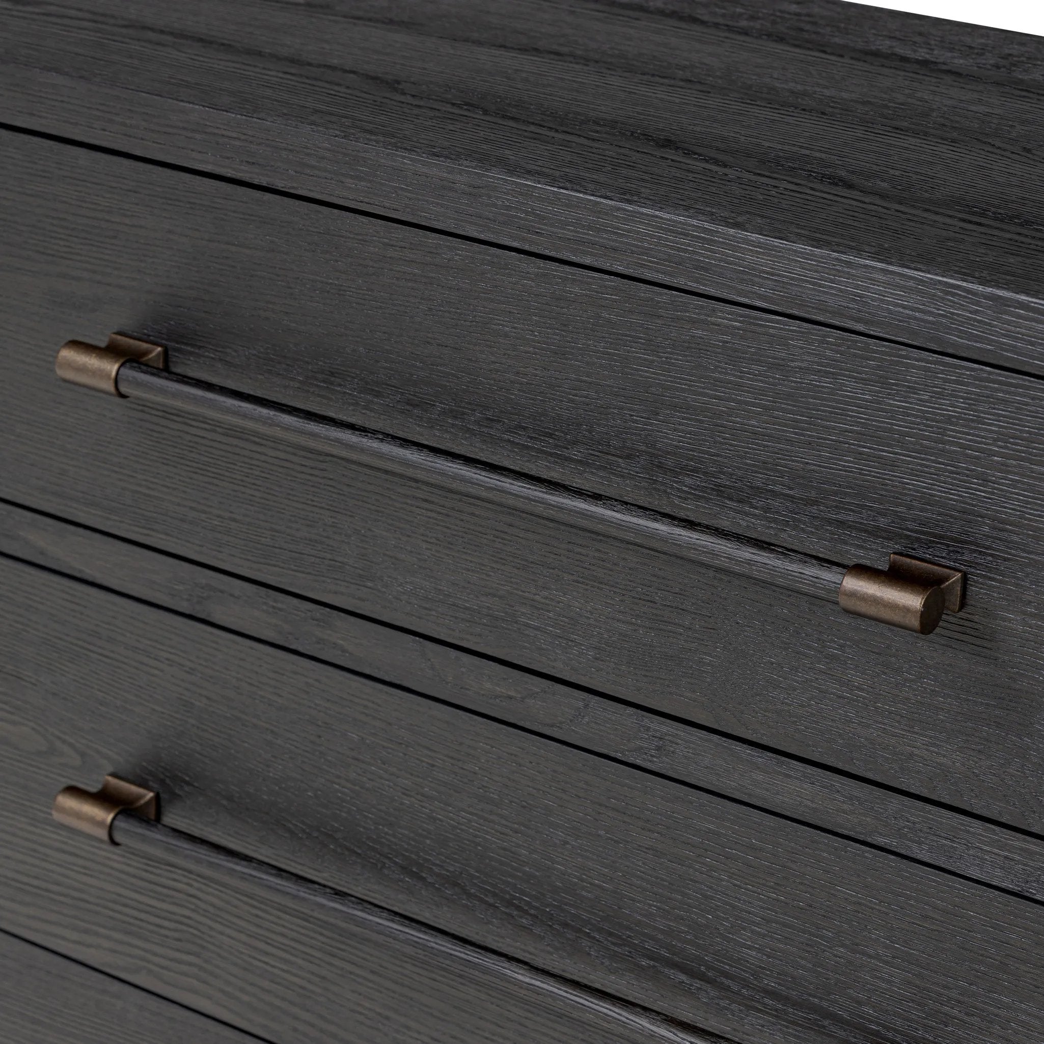 Featuring Adolfo Modern Black Ash 6 Drawer Dresser by Four Hands at Amethyst Home. Beautifully minimalist. A six-drawer dresser made from black-finished ash  features long, linear bronzed hardware for a smooth, clean look.Overall Dimensions: 72.00"w x 21.50"d x 32.25"hWeight : 306.44 lbsMaterials: Ash Veneer, Solid Ash. Amethyst Home provides interior design, new home construction design consulting, vintage area rugs, and lighting in the Calabasas metro area.
