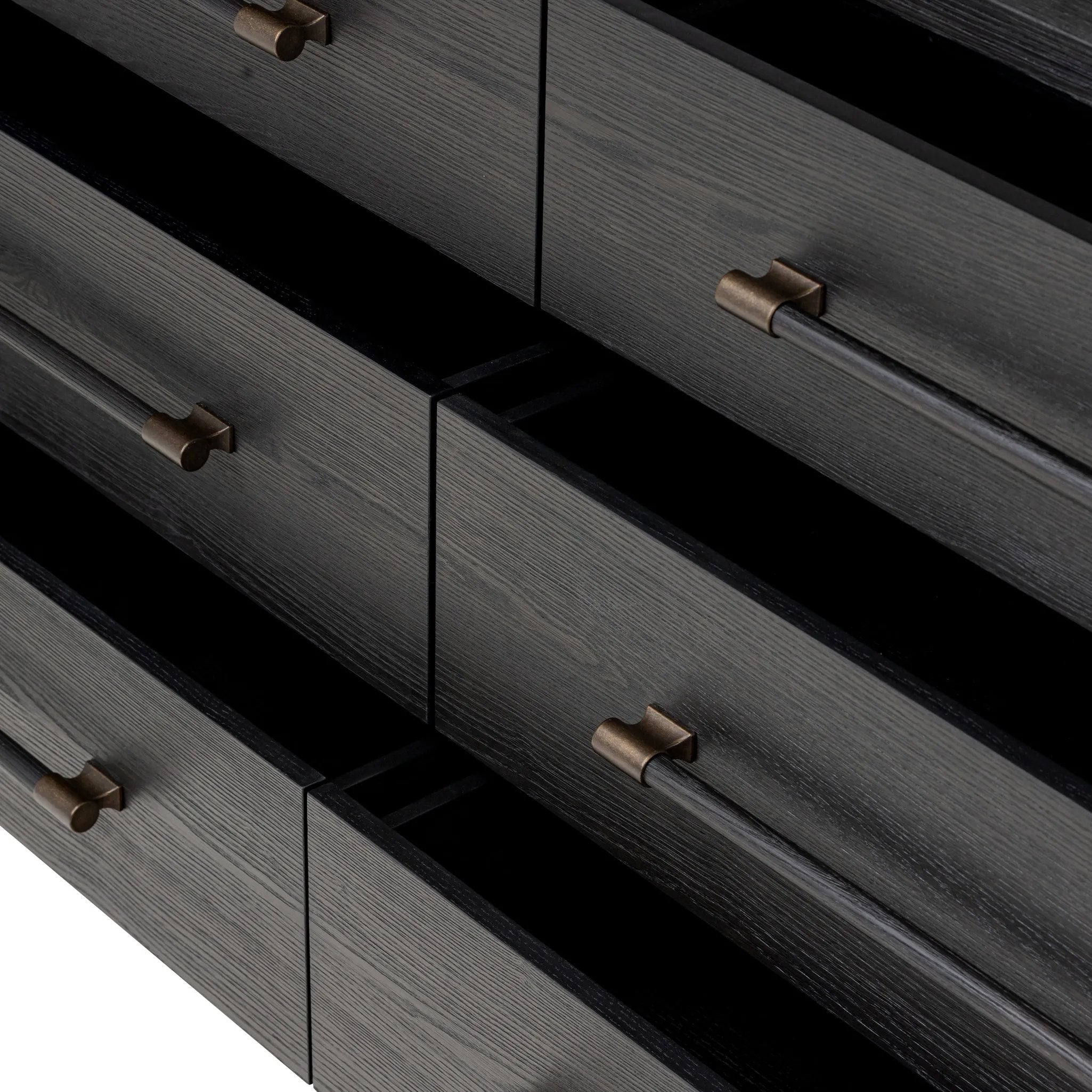 Featuring Adolfo Modern Black Ash 6 Drawer Dresser by Four Hands at Amethyst Home. Beautifully minimalist. A six-drawer dresser made from black-finished ash  features long, linear bronzed hardware for a smooth, clean look.Overall Dimensions: 72.00"w x 21.50"d x 32.25"hWeight : 306.44 lbsMaterials: Ash Veneer, Solid Ash. Amethyst Home provides interior design, new home construction design consulting, vintage area rugs, and lighting in the Charlotte metro area.