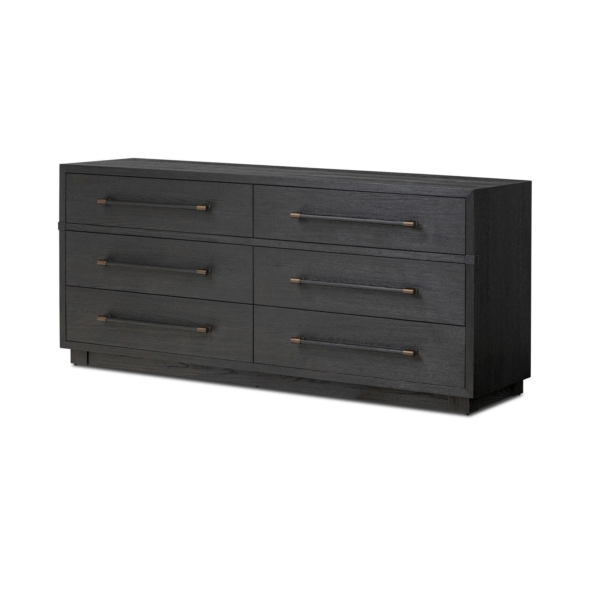 Beautifully minimalist. A six-drawer dresser made from black-finished ash  features long, linear bronzed hardware for a smooth, clean look Amethyst Home provides interior design, new home construction design consulting, vintage area rugs, and lighting in the Miami metro area.