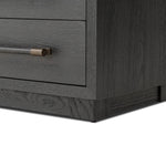 Featuring Adolfo Modern Black Ash Nightstand by Four Hands at Amethyst Home. Beautifully minimalist. A three-drawer dresser made from black-finished ash  features long, linear bronzed hardware for a smooth, clean look.Overall Dimensions: 32.00"w x 20.50"d x 26.25"hWeight : 114.64 lbsMaterials: Ash Veneer, Solid Ash. Amethyst Home provides interior design, new home construction design consulting, vintage area rugs, and lighting in the Austin metro area.