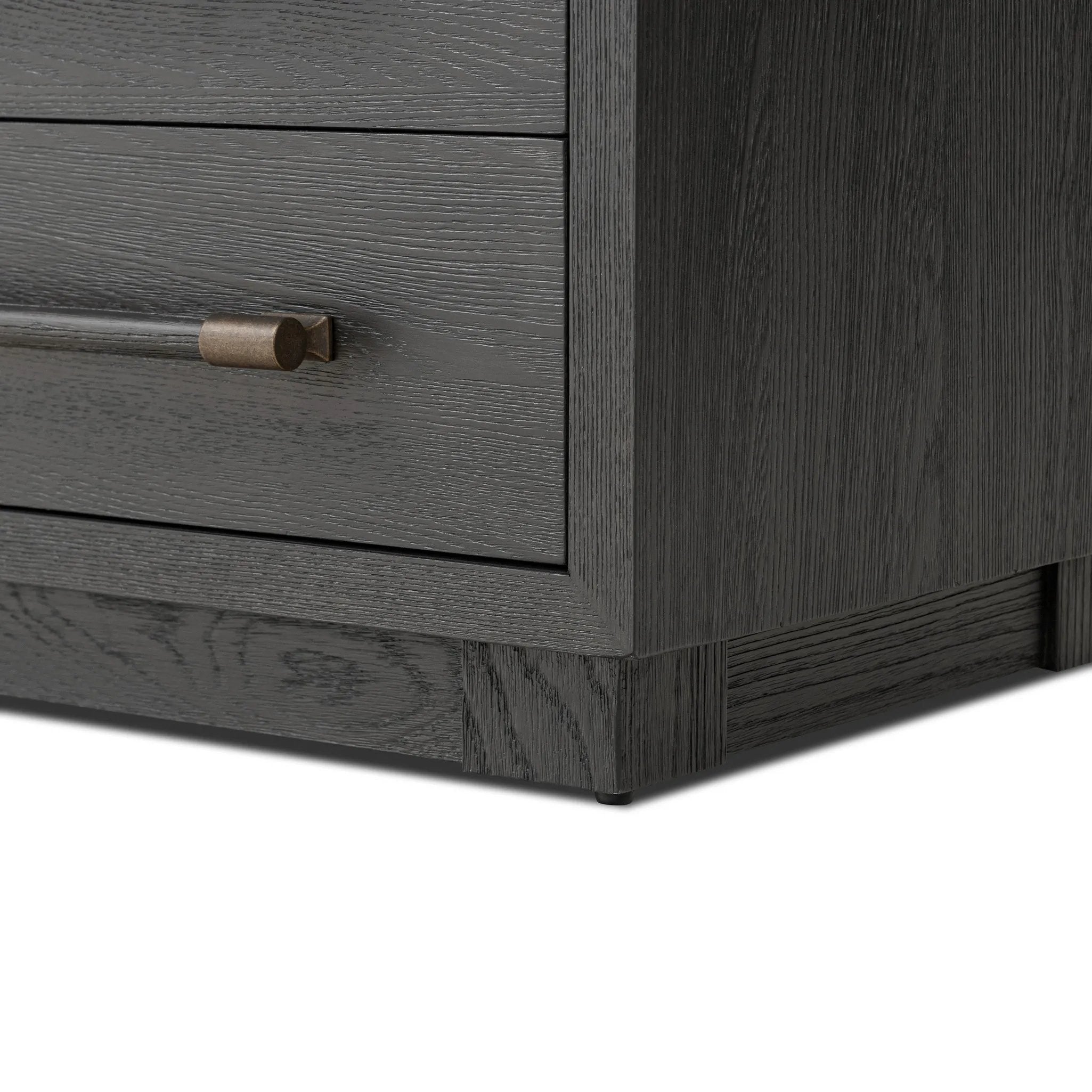 Featuring Adolfo Modern Black Ash Nightstand by Four Hands at Amethyst Home. Beautifully minimalist. A three-drawer dresser made from black-finished ash  features long, linear bronzed hardware for a smooth, clean look.Overall Dimensions: 32.00"w x 20.50"d x 26.25"hWeight : 114.64 lbsMaterials: Ash Veneer, Solid Ash. Amethyst Home provides interior design, new home construction design consulting, vintage area rugs, and lighting in the Austin metro area.