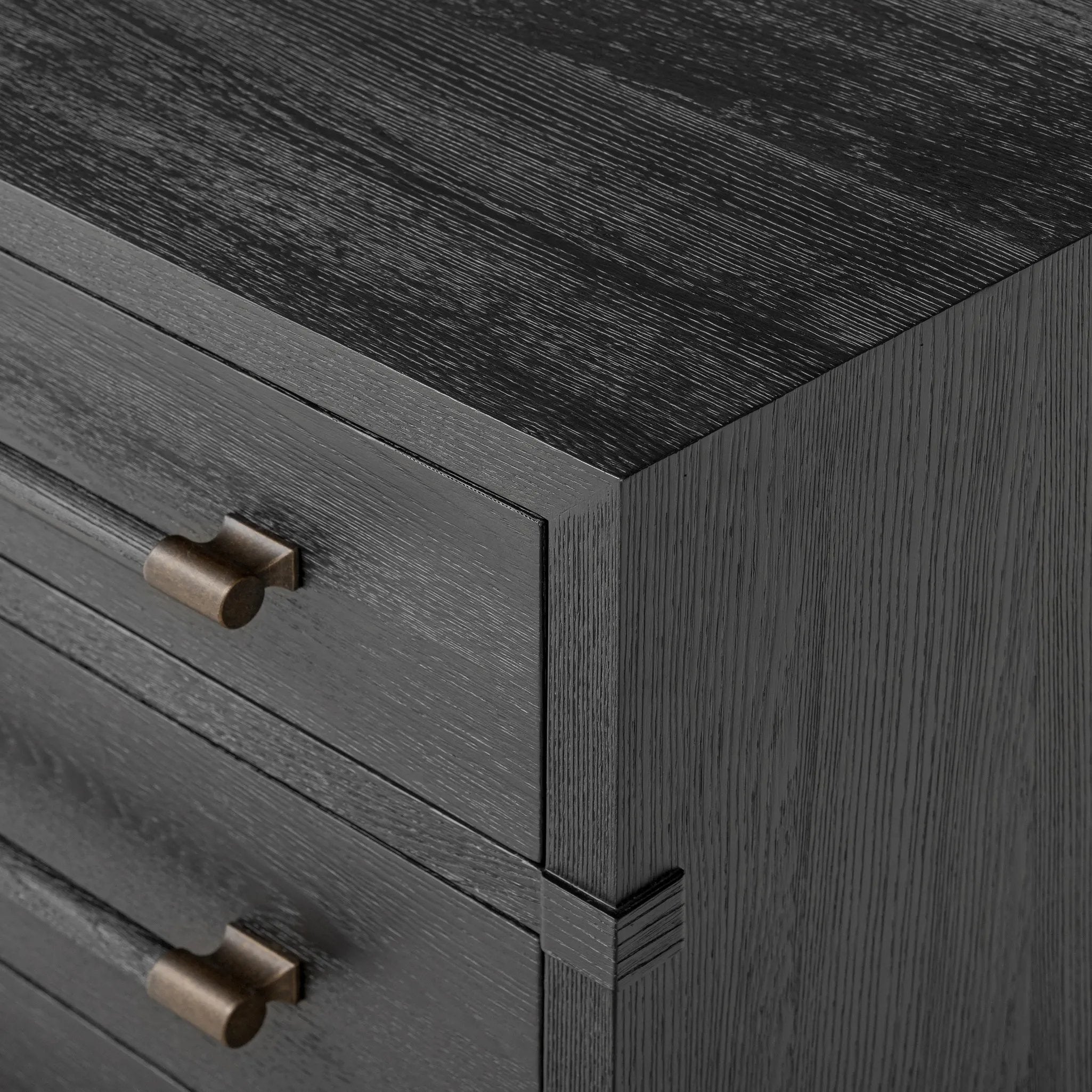 Featuring Adolfo Modern Black Ash Nightstand by Four Hands at Amethyst Home. Beautifully minimalist. A three-drawer dresser made from black-finished ash  features long, linear bronzed hardware for a smooth, clean look.Overall Dimensions: 32.00"w x 20.50"d x 26.25"hWeight : 114.64 lbsMaterials: Ash Veneer, Solid Ash. Amethyst Home provides interior design, new home construction design consulting, vintage area rugs, and lighting in the Monterey metro area.