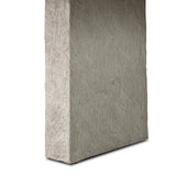 This outdoor dining table features a double pedestal silhouette that's defined by striking contrast between a smooth, refined top and heavily textured legs for a look that's straight from the quarry. It comes together with a water transfer technique on concrete that mimics natural marble. Amethyst Home provides interior design, new home construction design consulting, vintage area rugs, and lighting in the Los Angeles metro area.