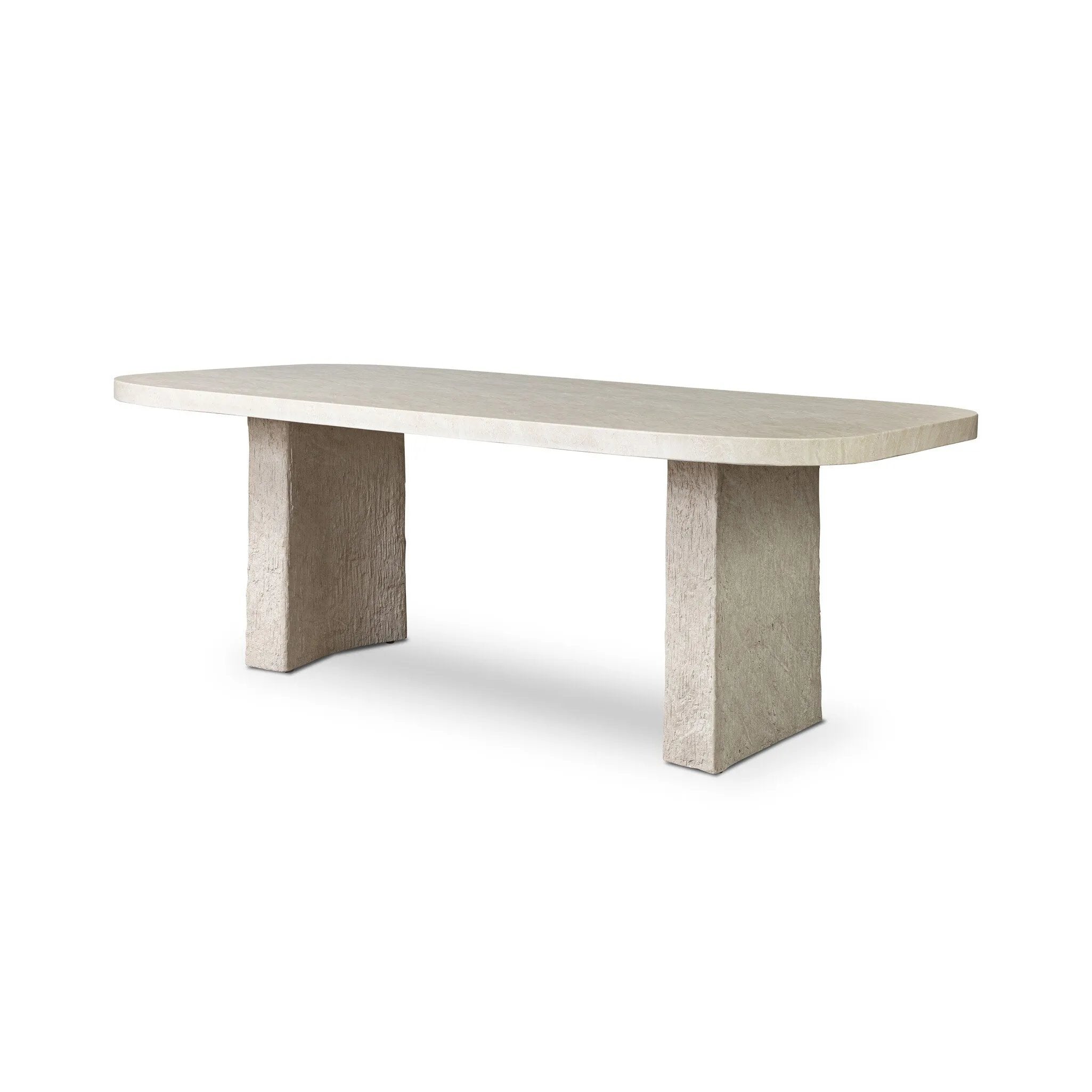 This outdoor dining table features a double pedestal silhouette that's defined by striking contrast between a smooth, refined top and heavily textured legs for a look that's straight from the quarry. It comes together with a water transfer technique on concrete that mimics natural marble. Amethyst Home provides interior design, new home construction design consulting, vintage area rugs, and lighting in the Seattle metro area.