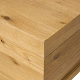 Inspired by classic Chinese antiques, this heritage-style trunk blends timeless design with modern functionality. Crafted from oak with a light, toasted finish, bronzed latch-and-key hardware adds a playful design detail Amethyst Home provides interior design, new home construction design consulting, vintage area rugs, and lighting in the Dallas metro area.